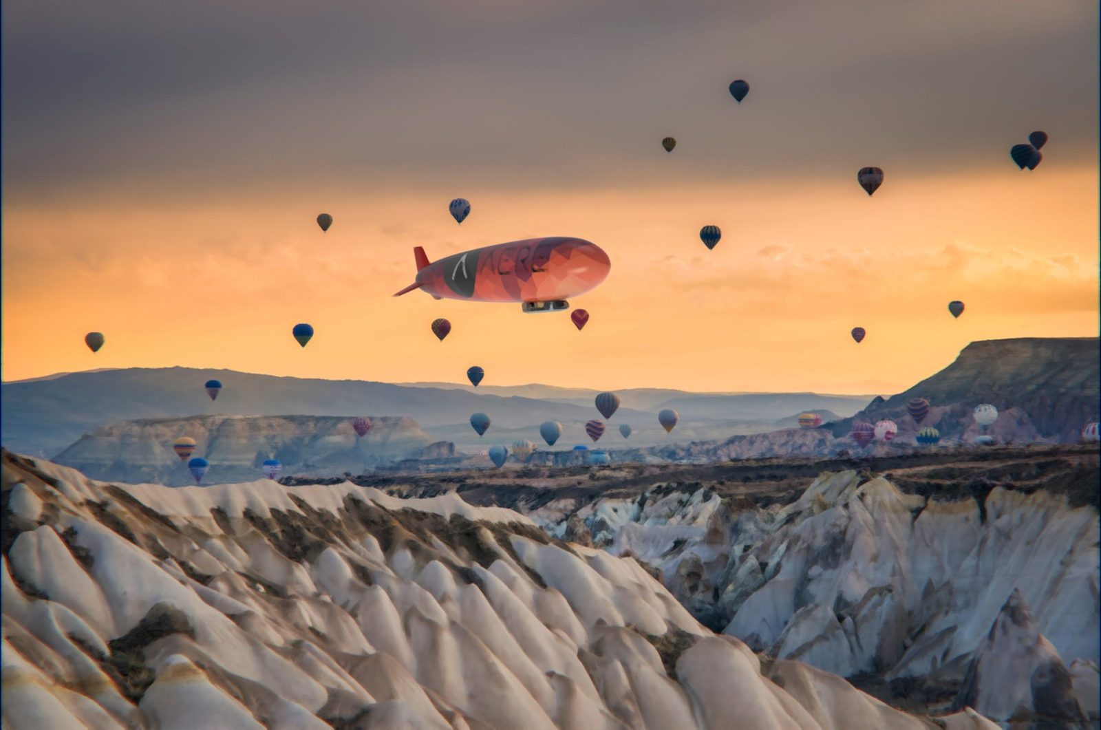 Cappadocia valleys at sunrise with balloons and the Wanderer